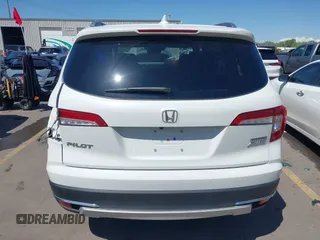 2021 Honda Pilot Touring 8-Passenger z VIN 5FNYF6H94MB087593, wystawiony jako IAAI lot #42153310 z przebiegiem 30 400 mil mil oraz . Historia ofert i sprzedaży dostępna na DreamBid. Obrazek 16.