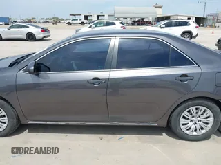 2014 Toyota Camry L with VIN 4T4BF1FKXER379158, listed as a IAAI auction lot 42050926 with 88,060 mi miles and . Bid and sale history available at DreamBid. Image 14.