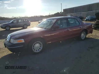 2002 Ford Crown Victoria LX z VIN 2FAFP74W62X158687, wystawiony jako Copart lot #86747964 z przebiegiem 158 551 mil mil oraz Szkody całkowita. Historia ofert i sprzedaży dostępna na DreamBid. Obrazek 1.