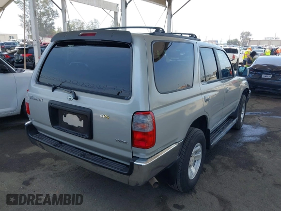 1999 Toyota 4Runner SR5 with VIN JT3GN86R5X0120573, listed as a IAAI auction lot 42450908 with 161,227 mi miles and . Bid and sale history available at DreamBid. Image 4.