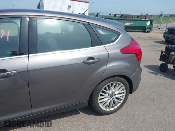 2014 Ford Focus Titanium with VIN 1FADP3N26EL453107, listed as a IAAI auction lot 42745891 with 148,743 mi miles and . Bid and sale history available at DreamBid. Image 6.