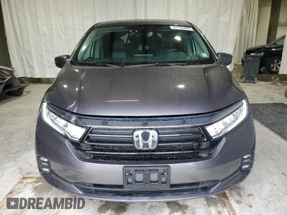 2022 Honda Odyssey EX-L with VIN 5FNRL6H74NB053215, listed as a Copart auction lot 54205895 with 57,958 mi miles and Salvage Title. Bid and sale history available at DreamBid. Image 5.