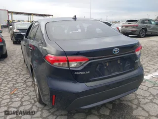 2020 Toyota Corolla Hybrid LE with VIN JTDEBRBE8LJ022596, listed as a IAAI auction lot 41772107 with 49,563 mi miles. Bid and sale history available at carsss.com. Image 3.