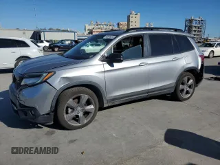 2019 Honda Passport Touring z VIN 5FNYF7H93KB003038, wystawiony jako Copart lot #48974815 z przebiegiem 70 399 mil mil oraz Szkody całkowita. Historia ofert i sprzedaży dostępna na DreamBid. Obrazek 1.