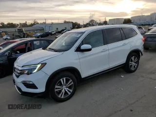 2018 Honda Pilot EX-L with VIN 5FNYF5H60JB016631, listed as a Copart auction lot 87334984 with 88,300 mi miles and Salvage title. Bid and sale history available at DreamBid. Image 1.