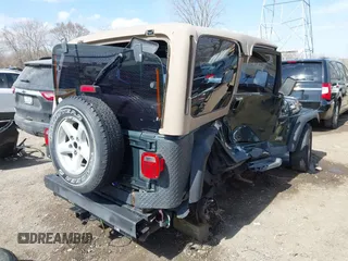 2002 Jeep Wrangler Sport with VIN 1J4FA49S62P743771, listed as a IAAI auction lot 41791205 with 186,622 mi miles. Bid and sale history available at carsss.com. Image 6.