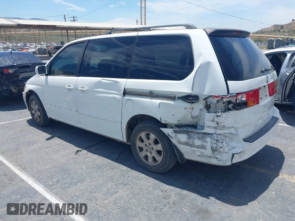 2003 Honda Odyssey EX-L z VIN 5FNRL18033B095684, wystawiony jako IAAI lot #42289617 z przebiegiem 174 336 mil mil oraz . Historia ofert i sprzedaży dostępna na DreamBid. Obrazek 3.