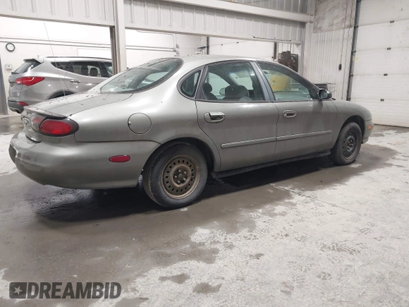 1999 Ford Taurus LX Standard with VIN 1FAFP52U0XG308165, listed as a IAAI auction lot 42509140 with 238,920 mi miles and . Bid and sale history available at DreamBid. Image 4.