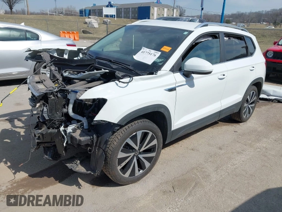 2024 Volkswagen Taos SE z VIN 3VVSX7B25RM071752, wystawiony jako IAAI lot #41775176 z przebiegiem 11 262 mil mil oraz . Historia ofert i sprzedaży dostępna na DreamBid. Obrazek 2.