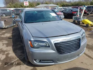 2014 Chrysler 300 with VIN 2C3CCAGG7EH255782, listed as a IAAI auction lot 41689454 with 148,912 mi miles. Bid and sale history available at carsss.com. Image 1.