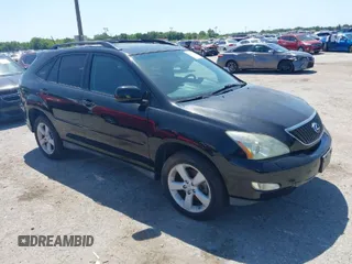 2007 Lexus RX 350 with VIN 2T2HK31U57C010986, listed as a IAAI auction lot 42033968 with 115,166 mi miles. Bid and sale history available at carsss.com. Image 1.