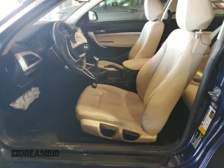 2015 BMW 2 Series 228i with VIN WBA1F5C54FVW98189, listed as a Copart auction lot 61815175 with 67,216 mi miles and Salvage title. Bid and sale history available at DreamBid. Image 7.