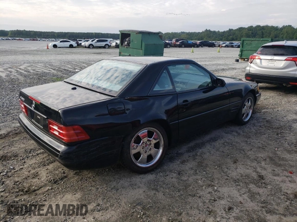 2000 Mercedes-Benz SL-Class with VIN WDBFA68F0YF190618, listed as a Copart auction lot 64791414 with 24,489 mi miles and Salvage Title. Bid and sale history available at carsss.com. Image 3.