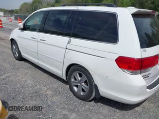2010 Honda Odyssey Touring с VIN 5FNRL3H90AB039449, выставлен на аукционе IAAI как лот 42032203 с пробегом 128 265 миль миль и . История ставок и продаж доступна на DreamBid. Изображение 3.