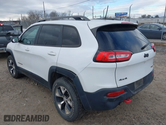 2017 Jeep Cherokee Trailhawk z VIN 1C4PJMBS4HW647835, wystawiony jako IAAI lot #41375077 z przebiegiem 87 208 mil mil oraz . Historia ofert i sprzedaży dostępna na DreamBid. Obrazek 3.
