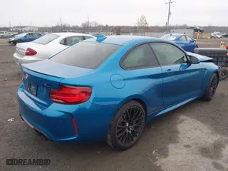 2021 BMW M2 Competition with VIN WBS2U7C02M7H63454, listed as a IAAI auction lot 41063808 with 15,047 mi miles. Bid and sale history available at carsss.com. Image 4.