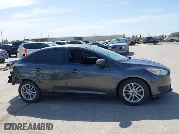 2018 Ford Focus SE with VIN 1FADP3F2XJL302358, listed as a IAAI auction lot 41807622 with 76,145 mi miles. Bid and sale history available at carsss.com. Image 13.