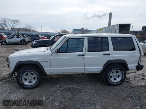 1996 Jeep Cherokee Sport with VIN 1J4FJ68S6TL234012, listed as a IAAI auction lot 41571658 with 255,817 mi miles. Bid and sale history available at carsss.com. Image 15.