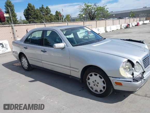1998 Mercedes-Benz E-Class with VIN WDBJF65F5WA702626, listed as a IAAI auction lot 42014815 with 113,632 mi miles. Bid and sale history available at carsss.com. Image 1.