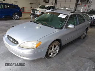 2001 Ford Taurus SE Standard with VIN 1FAFP58U91G202523, listed as a IAAI auction lot 42092190 with 197,961 mi miles. Bid and sale history available at carsss.com. Image 2.