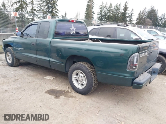 2000 Dodge Dakota Sport with VIN 1B7GL22N6YS764185, listed as a IAAI auction lot 41570275 with 157,334 mi miles. Bid and sale history available at carsss.com. Image 3.