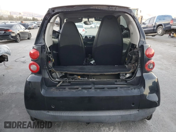 2008 Smart fortwo Pure z VIN WMEEJ31X48K150064, wystawiony jako Copart lot #42133475 z przebiegiem 103 280 mil mil oraz Szkody całkowita. Historia ofert i sprzedaży dostępna na DreamBid. Obrazek 6.