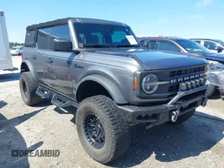 2022 Ford Bronco with VIN 1FMDE5BH9NLB87372, listed as a IAAI auction lot 42178135 with 71,585 mi miles and . Bid and sale history available at DreamBid. Image 1.