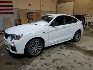 2018 BMW X4 M40i with VIN 5UXXW7C55J0W63951, listed as a Copart auction lot 42770515 with 126,931 mi miles and Salvage Title. Bid and sale history available at carsss.com. Image 1.