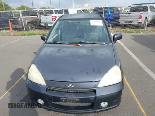 2003 Suzuki Aerio S z VIN JS2RA41S135158128, wystawiony jako IAAI lot #41425178 z przebiegiem 166 019 mil mil oraz . Historia ofert i sprzedaży dostępna na DreamBid. Obrazek 6.