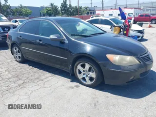 2005 Acura RL with VIN JH4KB16575C007995, listed as a IAAI auction lot 42638944 with 241,591 mi miles and . Bid and sale history available at DreamBid. Image 1.