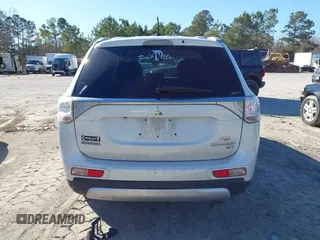 2015 Mitsubishi Outlander GT with VIN JA4JZ4AX4FZ013037, listed as a IAAI auction lot 41683425 with 172,700 mi miles and . Bid and sale history available at DreamBid. Image 16.