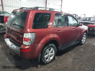 2010 Mercury Mariner Premier with VIN 4M2CN8HG9AKJ01231, listed as a IAAI auction lot 41868769 with 99,322 mi miles. Bid and sale history available at carsss.com. Image 4.