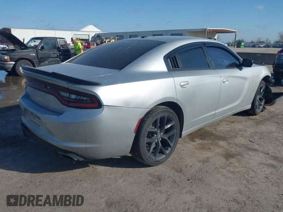 2019 Dodge Charger SXT with VIN 2C3CDXBG5KH626442, listed as a IAAI auction lot 41666237 with 84,920 mi miles. Bid and sale history available at carsss.com. Image 4.