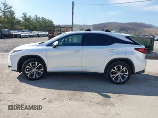 2016 Lexus RX 450h with VIN 2T2BGMCAXGC004844, listed as a IAAI auction lot 41791066 with 100,604 mi miles and . Bid and sale history available at DreamBid. Image 14.