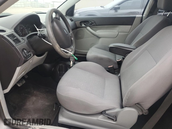 2007 Ford Focus S with VIN 1FAFP31N87W226088, listed as a Copart auction lot 88584555 with 83,896 mi miles and Salvage Title. Bid and sale history available at DreamBid. Image 7.