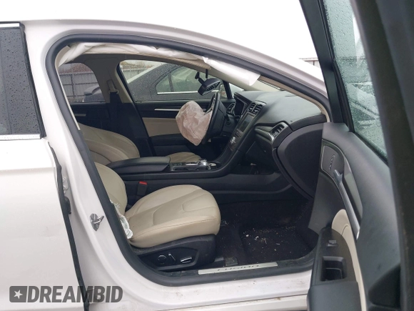 2017 Ford Fusion Hybrid Titanium с VIN 3FA6P0RUXHR317572, выставлен на аукционе IAAI как лот 42170169 с пробегом 138 987 миль миль и . История ставок и продаж доступна на DreamBid. Изображение 5.