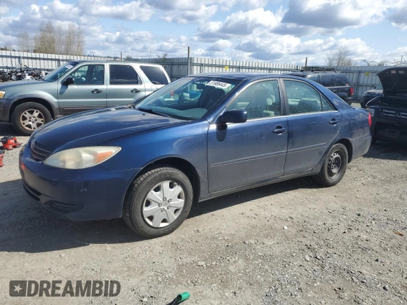 2004 Toyota Camry LE with VIN 4T1BE32K44U270644, listed as a Copart auction lot 51986445 with 257,429 mi miles and Salvage Title. Bid and sale history available at DreamBid. Image 1.