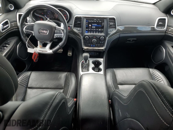 2018 Jeep Grand Cherokee Trackhawk with VIN 1C4RJFN91JC223825, listed as a Copart auction lot 58011465 with 83,177 mi miles and Salvage title. Bid and sale history available at DreamBid. Image 8.