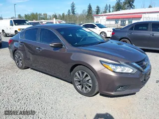 2017 Nissan Altima 2.5 SR with VIN 1N4AL3AP8HC180059, listed as a IAAI auction lot 42075133 with 197,955 mi miles. Bid and sale history available at carsss.com. Image 1.