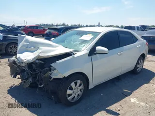 2019 Toyota Corolla L with VIN 5YFBURHE0KP882524, listed as a IAAI auction lot 41862382 with 84,981 mi miles. Bid and sale history available at carsss.com. Image 2.