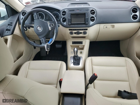 2017 Volkswagen Tiguan Wolfsburg Edition with VIN WVGSV7AX0HK014796, listed as a Copart auction lot 51113015 with 51,592 mi miles and Salvage Title. Bid and sale history available at carsss.com. Image 8.