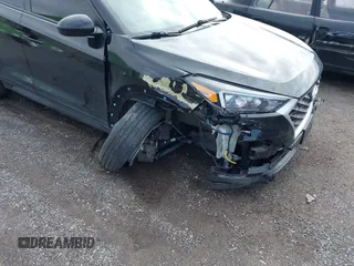 2019 Hyundai Tucson SE with VIN KM8J2CA46KU977863, listed as a IAAI auction lot 41704318 with 23,076 mi miles. Bid and sale history available at carsss.com. Image 6.
