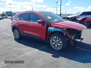 2020 Ford Escape Titanium Hybrid z VIN 1FMCU0DZ3LUC09896, wystawiony jako IAAI lot #41295654 z przebiegiem 28 074 mil mil oraz . Historia ofert i sprzedaży dostępna na DreamBid. Obrazek 1.