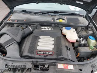 2002 Audi S6 z VIN WAUXU54B62N070925, wystawiony jako IAAI lot #38122381 z przebiegiem 219 441 mil mil oraz . Historia ofert i sprzedaży dostępna na DreamBid. Obrazek 10.