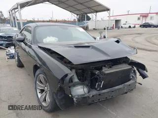 2019 Dodge Challenger SXT с VIN 2C3CDZAG2KH701594, выставлен на аукционе IAAI как лот 42349431 с пробегом 67 414 миль миль и . История ставок и продаж доступна на DreamBid. Изображение 1.