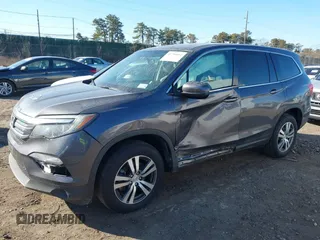 2017 Honda Pilot EX-L with VIN 5FNYF6H59HB101815, listed as a IAAI auction lot 41704661 with 130,479 mi miles and . Bid and sale history available at DreamBid. Image 6.