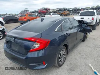 2018 Honda Civic EX with VIN 19XFC2F75JE035935, listed as a IAAI auction lot 41795110 with 92,687 mi miles and . Bid and sale history available at DreamBid. Image 4.