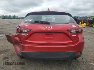 2014 Mazda 3 i Grand Touring z VIN JM1BM1M7XE1101669, wystawiony jako Copart lot #56504335 z przebiegiem 94 832 mil mil oraz Szkoda całkowita • Salvage title. Historia ofert i sprzedaży dostępna na DreamBid. Obrazek 6.