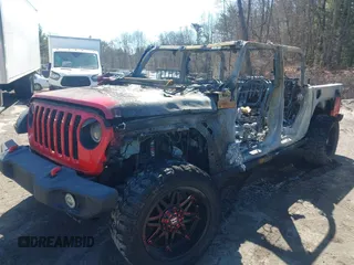 2020 Jeep Gladiator Sport S with VIN 1C6HJTAG7LL122586, listed as a IAAI auction lot 41771096 with Not Provided miles. Bid and sale history available at carsss.com. Image 2.