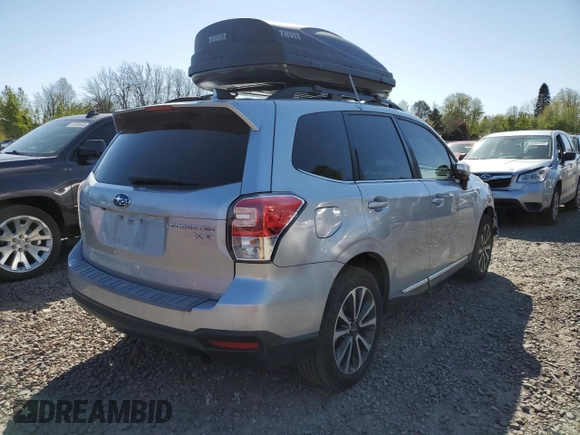 2017 Subaru Forester Touring с VIN JF2SJGTC8HH540442, выставлен на аукционе Copart как лот 52408715 с пробегом 104 016 миль миль и Списание • Salvage title. История ставок и продаж доступна на DreamBid. Изображение 3.